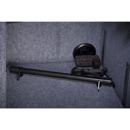 Installation view of the Stack-On SPAD-12 Electronic Safe Dehumidifier mounted inside a safe, featuring a 12-inch black dehumidifier rod with a power cord coiled neatly beside it, set against a grey felt-lined interior