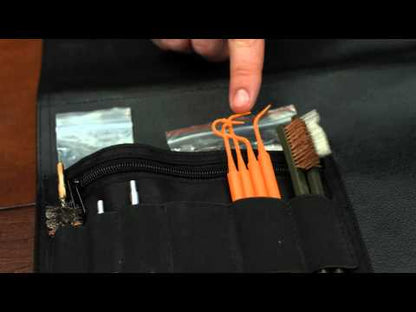 Complete gun cleaning kit with multi-section rod and five bronze brushes